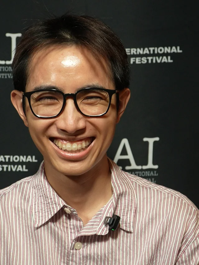 Tuan Hoang interviewed at the step and repeat