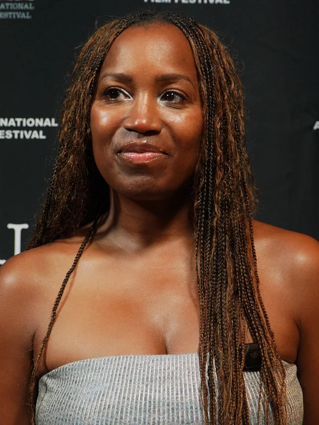 Monika Hyacinth interviewed at the step and repeat